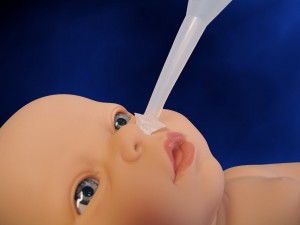 Little Sucker Nasal Tip demonstrated on a doll.